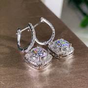 Luxury diamond drop earrings in silver, ideal for jewelry designers and collectors, suitable for elegant occasions, featured on jewelry websites and jewelry storage collections.