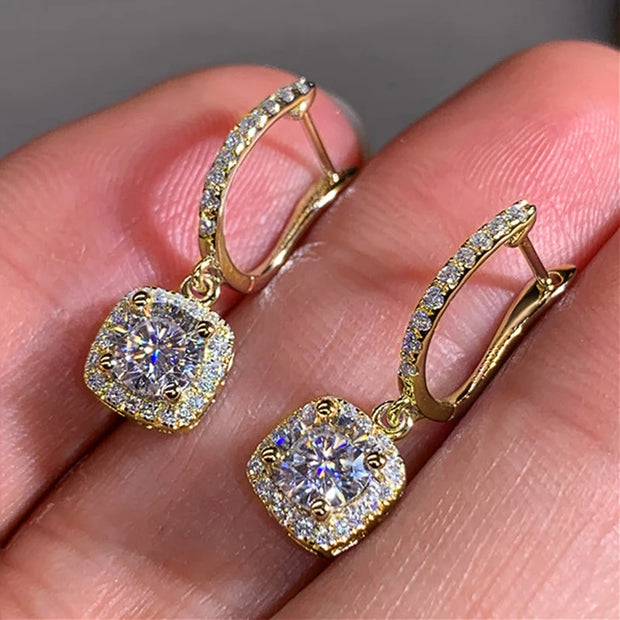 Luxury diamond drop earrings in silver, ideal for jewelry designers and collectors, suitable for elegant occasions, featured on jewelry websites and jewelry storage collections.