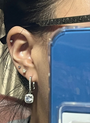 Luxury diamond drop earrings in silver, ideal for jewelry designers and collectors, suitable for elegant occasions, featured on jewelry websites and jewelry storage collections.