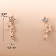 Gold star cluster earrings with sparkling crystals, ideal for jewelry websites, jewelry storage, diamond and jewelry lovers, and gifting for mom or special occasions.
