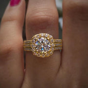 Stunning diamond engagement ring with halo setting and triple diamond bands, perfect for jewelry websites, jewelry storage, vintage jewelry, and proposals.
