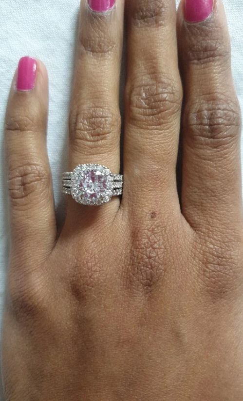 Stunning diamond engagement ring with halo setting and triple diamond bands, perfect for jewelry websites, jewelry storage, vintage jewelry, and proposals.