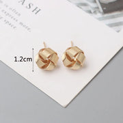 Gold knot earrings designed by jewelry designers, ideal for earrings piercing and vintage jewelry lovers, perfect for jewelry storage or as a gift in a jewelry case.