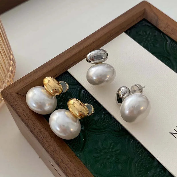 Elegant silver and pearl stud earrings, ideal for jewelry websites, jewelry storage, vintage jewelry, earrings piercing, and gifting for mom or jewelry lovers.